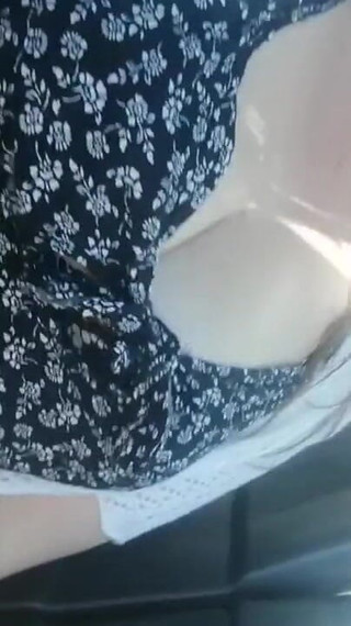 Quick Cleavage Flash in the Car