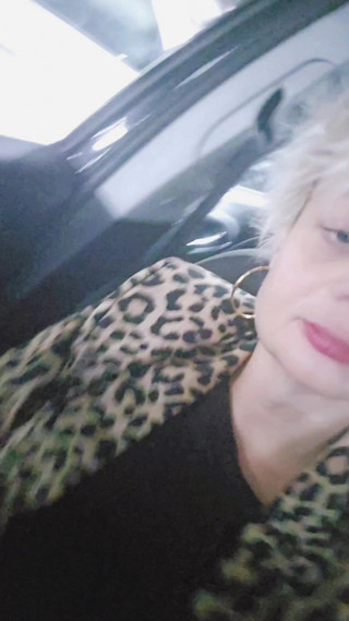 In the car waiting for a long queue